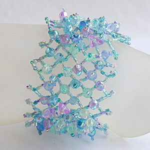 BRACCIALETTI A RETE CON PERLINE - Image 7