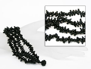 BRACCIALI CORALLO 4 FILI CON PERLINE