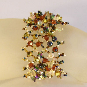 BRACCIALETTI A RETE CON PERLINE - Image 11