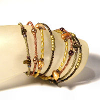 BRACCIALI PERLINE RIGIDI APERTI 8 FILI