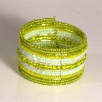 BRACCIALI RIGIDI CON PERLINE 15 FILI