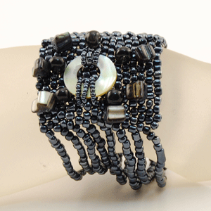 BRACCIALI ONDA CON CIONDOLO MADREPERLA - Image 36