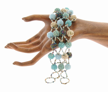 BRACCIALE APERTI 4 RIGHE PALLINE INTRECCIATE - Image 11