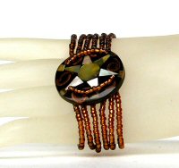 BRACCIALI PERLINE 6 FILI MADREPERLA COCCO STAR