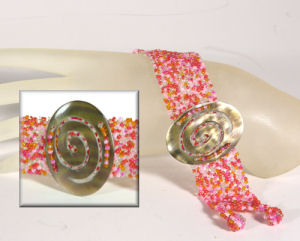 BRACCIALI PERLINE PEPESALE SPIRALE OVALE