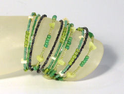 BRACCIALI PERLINE RIGIDI APERTI 11 FILI