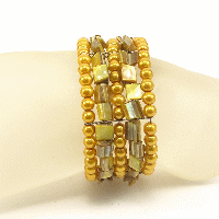 BRACCIALI RIGIDI 5 FILI MADREPERLA COL. E METAL