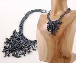 COLLANE GIROCOLLO NET RUMPUT CON FRANGE E PIETRE