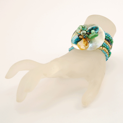 BRACCIALI ELASTICI CON FIORE MADREPERLA - Image 9