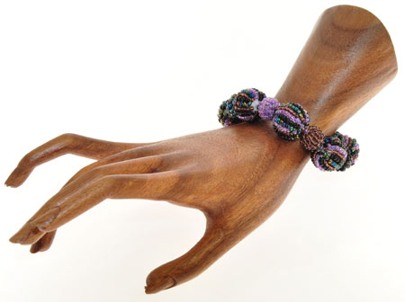 BRACCIALI CON PALLINE A SPICCHI - Image 9