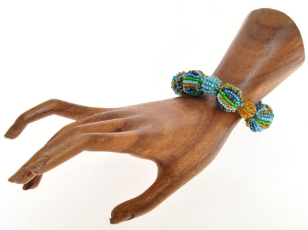 BRACCIALI CON PALLINE A SPICCHI - Image 14