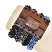 BRACCIALI ELASTICI CON FIBBIA IN LEGNO NET CURVA