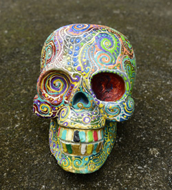 SCULTURA TESCHIO IN LEGNO DI ALBESIA DIPINTO CM 20 CIRCA