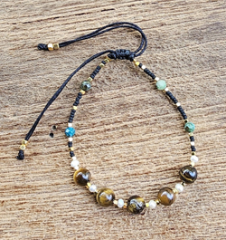 BRACCIALI LINEA SAMARKANDA CON PERLINE GIAPPONESI E PIETRA AMETISTA 6 MM, E TURCHESE AFRICA, PERLE DI FIUME E PERLINE IN OTTONE GOLD PLATED