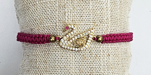 BRACCIALE TEMALI MACRAME CON CHARM GOLD PLATED A FORMA DI CIGNO CON ZIRCONI
