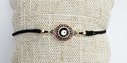BRACCIALI CORDINO PENDENTE OCCHIO CON ZIRCONI COLORATI SU METALLO GOLD PLATED