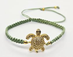 BRACCIALE FULL MACRAME' CON MEDAGLIA A FORMA DI TARTARUGA IN METALLO GOLD PLATED CON ZIRCONI