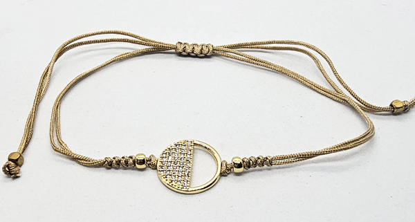 BRACCIALE TEMALI CON CORDINO COLORATO E MEDAGLIA IN METALLO GOLD PLATED CON ZIRCONI A FORMA DI CERCHIO MEZZO PIENO E MEZZO VUOTO - Image 3