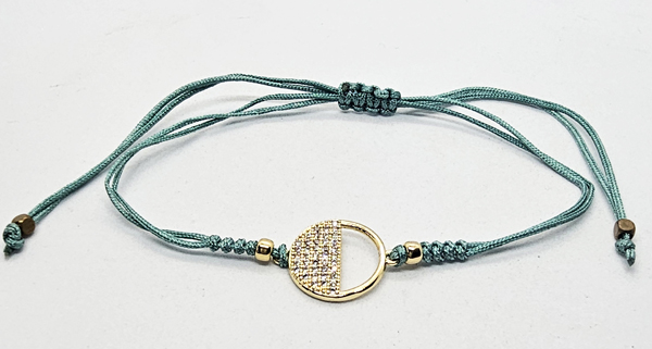 BRACCIALE TEMALI CON CORDINO COLORATO E MEDAGLIA IN METALLO GOLD PLATED CON ZIRCONI A FORMA DI CERCHIO MEZZO PIENO E MEZZO VUOTO - Image 10