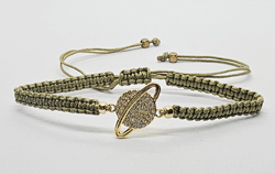 BRACCIALE FULL MACRAME' CON MEDAGLIA IN METALLO GOLD PLATED CON ZIRCONI PIANETA GIOVE