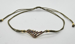 BRACCIALE TEMALI CON CORDINO COLORATO E MEDAGLIA A FORMA DI  ALA D'ANGELO IN METALLO GOLD PLATED CON ZIRCONI