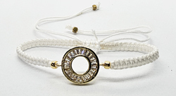 BRACCIALE FULL MACRAME' CON MEDAGLIA A FORMA DI DONUT IN METALLO GOLD PLATED CON ZIRCONI