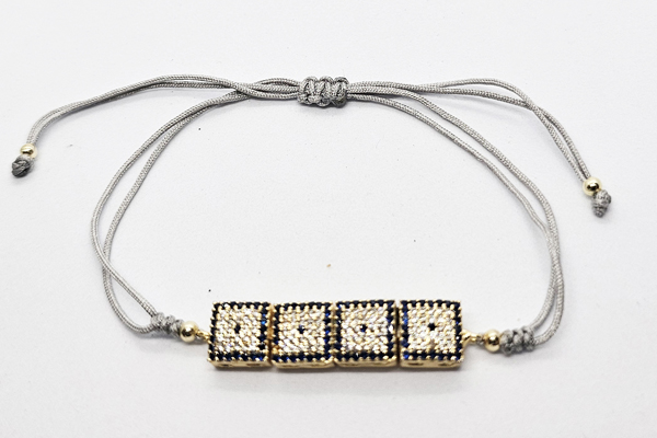 BRACCIALI CORDINO CON ZIRCONI SU METALLO GOLD PLATED PENDENTI SNODATI A FORMA DI 4 QUADRATI - Image 3