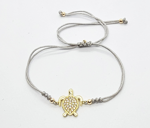BRACCIALE STRING CON ZIRCONI SU METALLO GOLD PLATED CON TARTARUGA MARINA - Image 2
