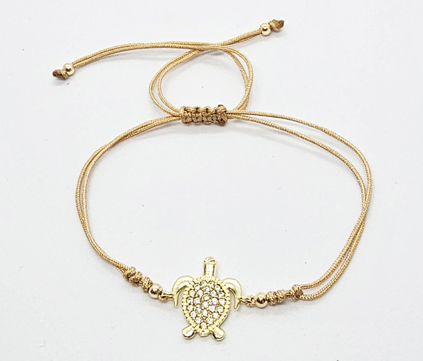 BRACCIALE STRING CON ZIRCONI SU METALLO GOLD PLATED CON TARTARUGA MARINA - Image 4