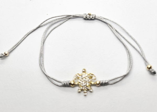 BRACCIALE STRING CON ZIRCONI SU METALLO GOLD PLATED CON TARTARUGA MARINA - Image 2