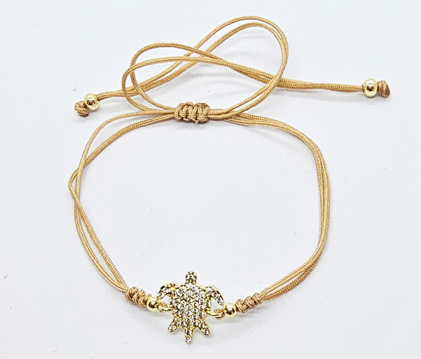 BRACCIALE STRING CON ZIRCONI SU METALLO GOLD PLATED CON TARTARUGA MARINA - Image 6