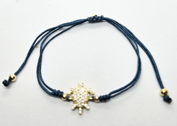 BRACCIALE STRING CON ZIRCONI SU METALLO GOLD PLATED CON TARTARUGA MARINA - Image 5